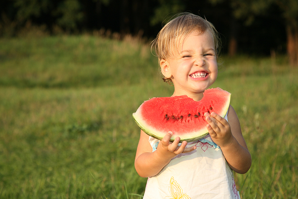 bigstock-Baby-With-Melon-1985712