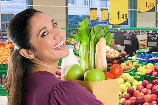bigstock-Young-woman-holding-a-grocery-14506829
