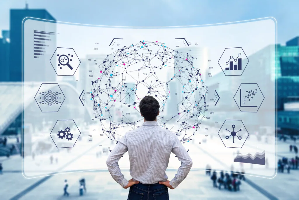 Person viewing digital display with global network visualization and data analytics icons